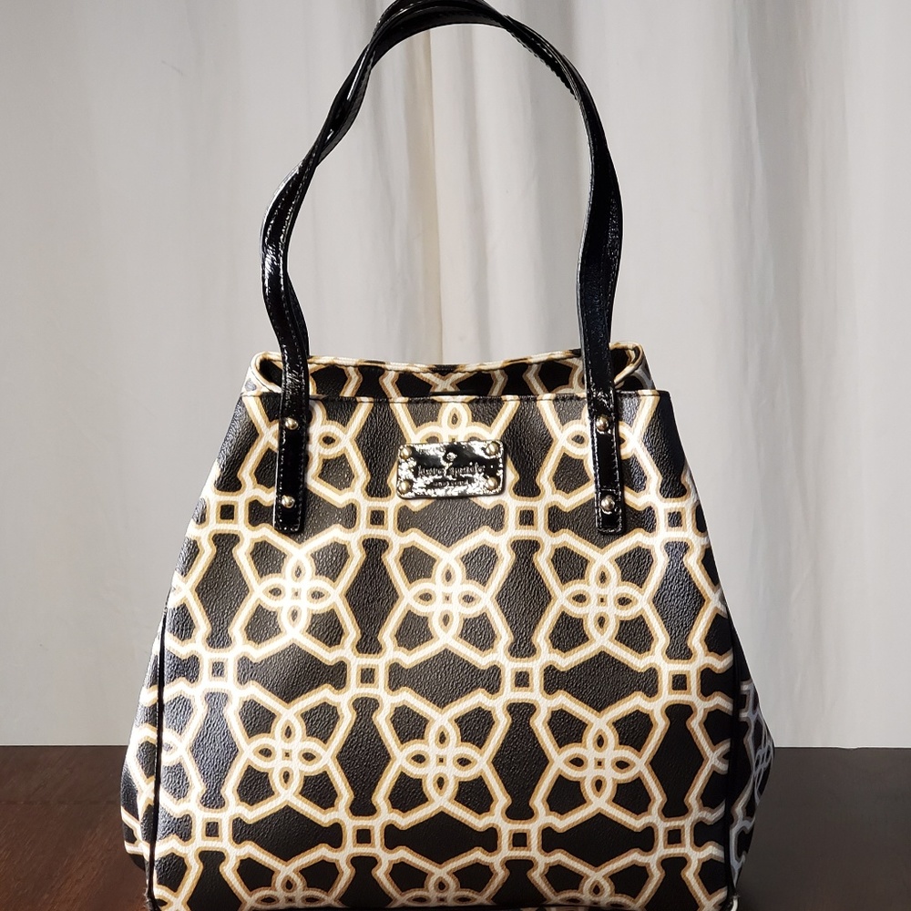 kate spade black purse with gold and white design